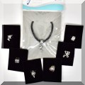 J179b. Infiniti charm bracelet with 6 extra charms. (Frog, dolphin, fish, rose, box and sheashell.) - $$16 each 